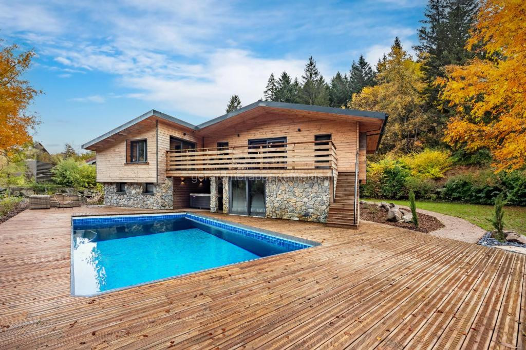 Photo de Chalet La Perle Verte, luxe, piscine, spa et sauna