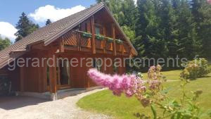 Photo de le Chalets Chalet cosy & confort Spa,Sauna,Pétanque,VE - Top situation à Gérardmer à Gérardmer
