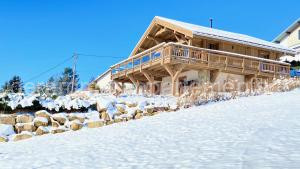 Photo de le Chalets Chalet Horizon 180 4 étoiles Sauna à Gérardmer