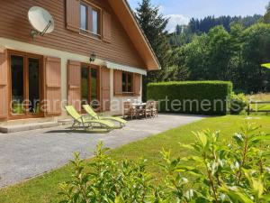 LE BOIS JOLI Chalet 4 étoiles CLEDICIHOME Cadre paisible en lisière de forêt à Gérardmer