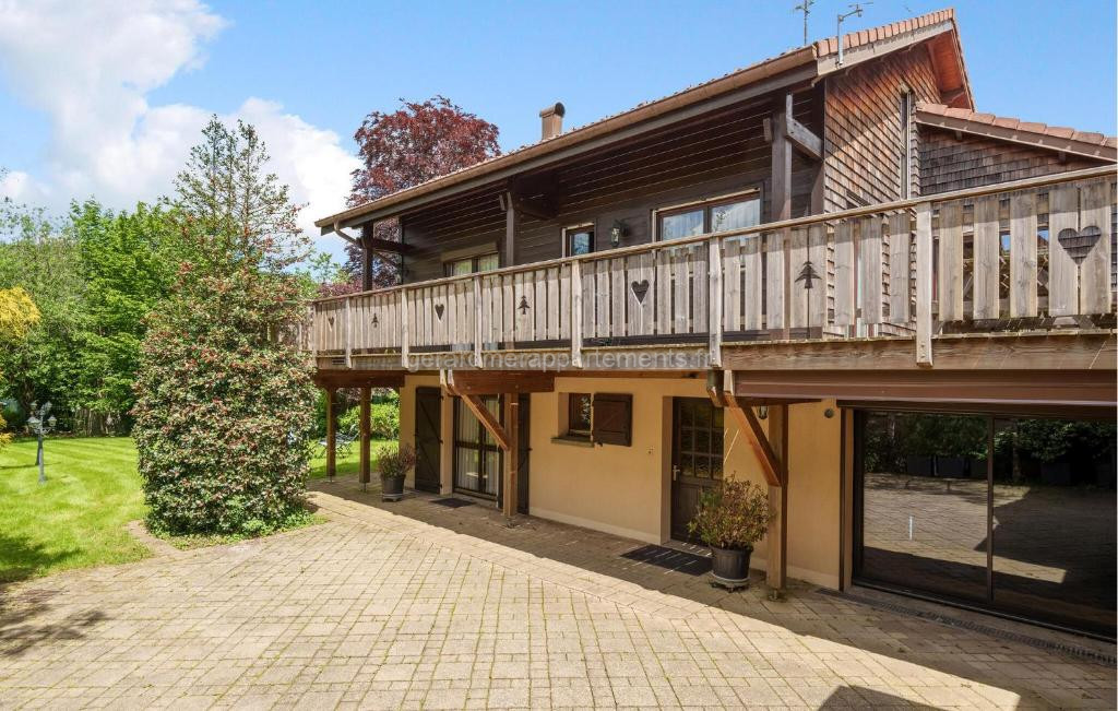 Photo de Nice Home In Gérardmer With Sauna